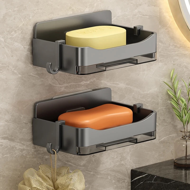 Drainage soap dish with adhesive and hooks